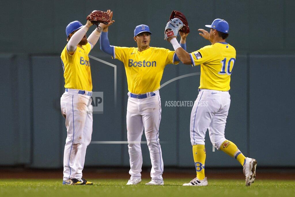 Michael Dwyer Boston Red Sox outfielders, from left, Alex Verdugo, Enrique Hernandez and Hunter Renfroe celebrate after the Red Sox defeated the Baltimore Orioles in a baseball game Friday, Sept. 17, 2021, in Boston. (AP Photo/Michael Dwyer)