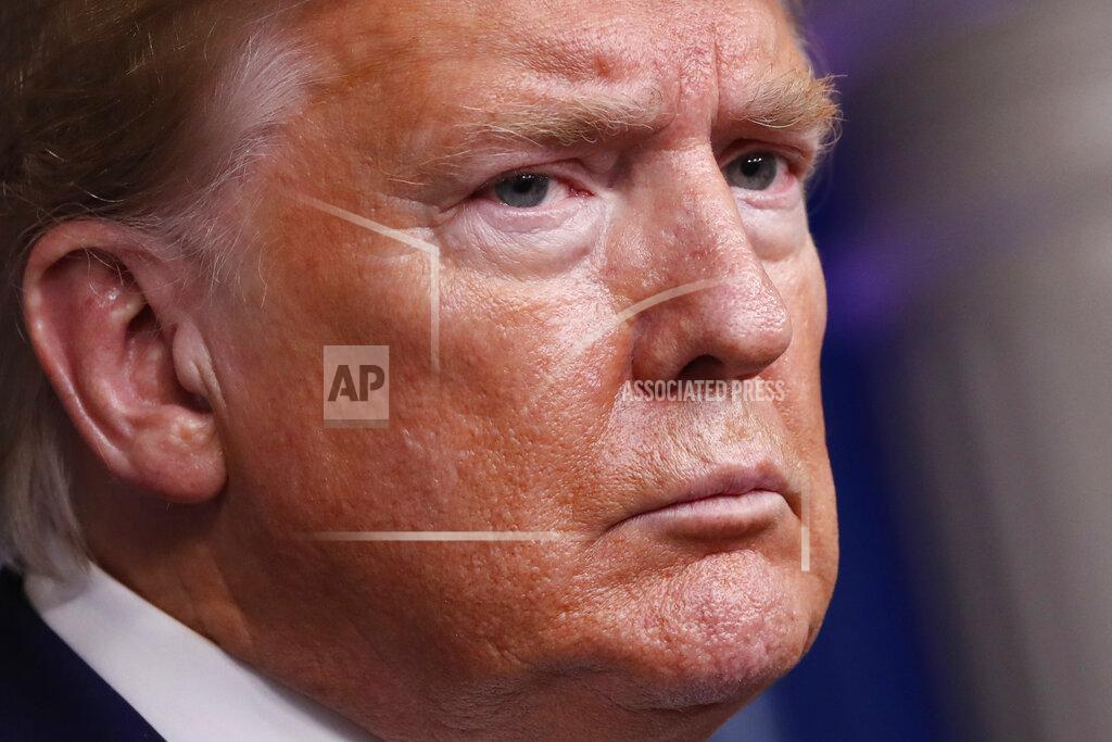 Alex Brandon President Donald Trump listens during a briefing about the coronavirus in the James Brady Press Briefing Room of the White House, Tuesday, April 21, 2020, in Washington. (AP Photo/Alex Brandon)