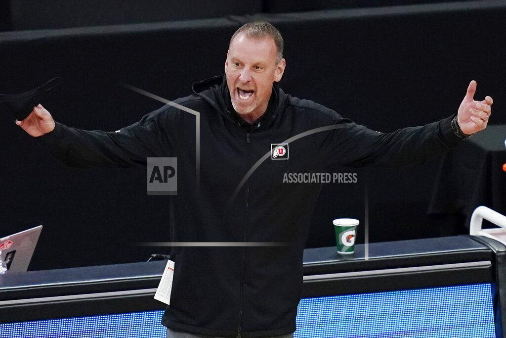 John Locher Utah head coach Larry Krystkowiak reacts during the first half of an NCAA college basketball game against Southern California in the quarterfinal round of the Pac-12 men's tournament Thursday, March 11, 2021, in Las Vegas. (AP Photo/John Locher)