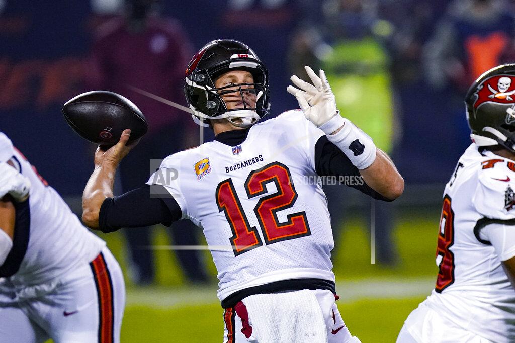 Charles Rex Arbogast Tampa Bay Buccaneers quarterback Tom Brady (12) throws a pass against the Chicago Bears during the first half of an NFL football game in Chicago, Thursday, Oct. 8, 2020. (AP Photo/Charles Rex Arbogast)