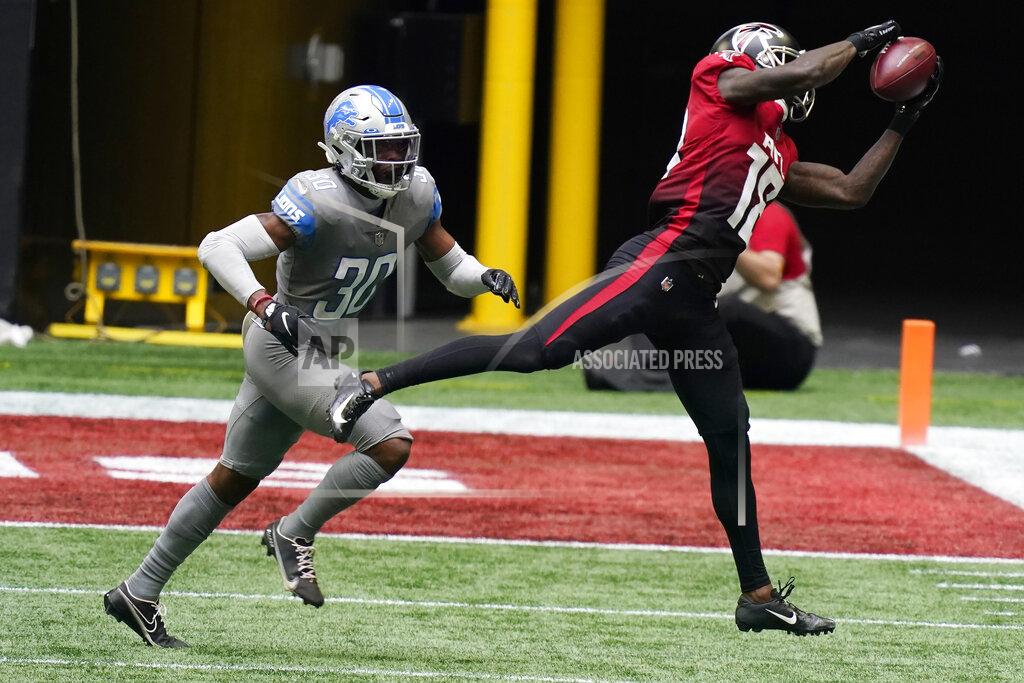 Brynn Anderson Atlanta Falcons wide receiver Calvin Ridley (18) makes the catch against Detroit Lions cornerback Jeff Okudah (30) during the second half of an NFL football game, Sunday, Oct. 25, 2020, in Atlanta. (AP Photo/Brynn Anderson)