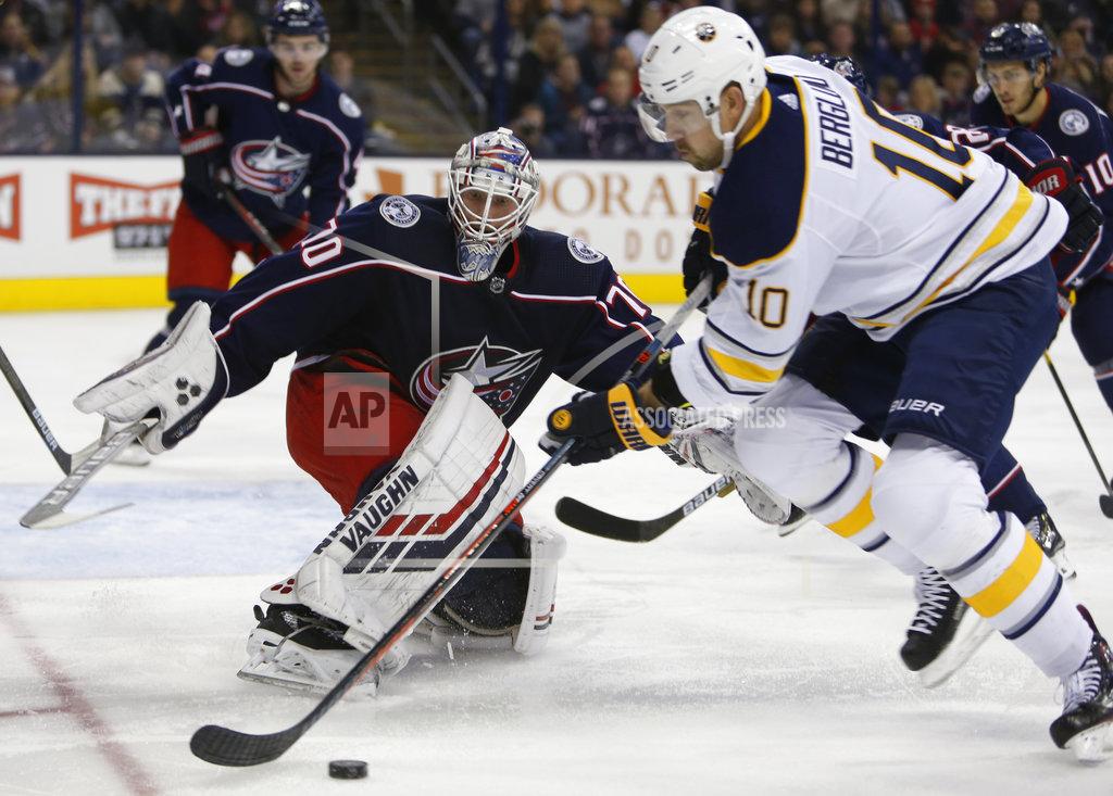 Jay Laprete Columbus Blue Jackets' Joonas Korpisalo, left, of Finland, protects the net from Buffalo Sabres' Patrik Berglund, of Sweden, during the first period of an NHL hockey game Saturday, Oct. 27, 2018, in Columbus, Ohio. (AP Photo/Jay LaPrete)