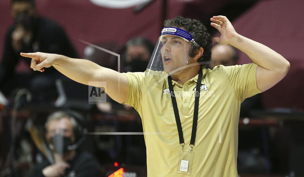 Georgia Tech head coach Josh Pastner points during the first half of an NCAA college basketball game against Virginia Tech Tuesday, Feb. 23, 2021, in Blacksburg, Va. (Matt Gentry/The Roanoke Times via AP, Pool)