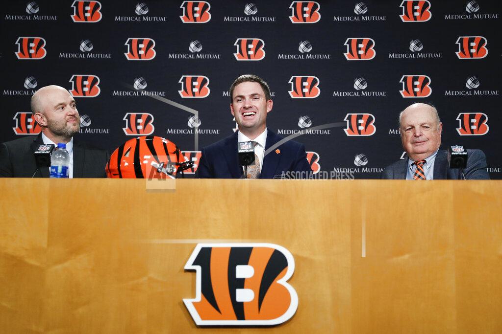 John Minchillo Cincinnati Bengals football head coach Zac Taylor, center, speaks alongside Bengals owner Mike Brown, right, and Duke Tobin, Bengals director of player personal, during a news conference, Tuesday, Feb. 5, 2019, in Cincinnati. After 16 years without a playoff win under Marvin Lewis, the Bengals decided to try something different. But they had to wait more than a month before hiring Zac Taylor as their next coach in hopes of ending a long streak of futility. (AP Photo/John Minchillo)