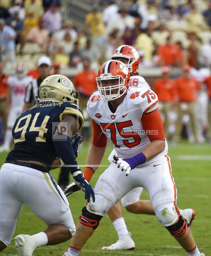Jon Barash FILE - In this Sept. 22, 2018, file photo, Clemson offensive tackle Mitch Hyatt (75) works against Georgia Tech during the first half of an NCAA college football game, in Atlanta. Hyatt was named to The Associated Press Midseason All-America team, Tuesday, Oct. 16, 2018.(AP Photo/Jon Barash, File)