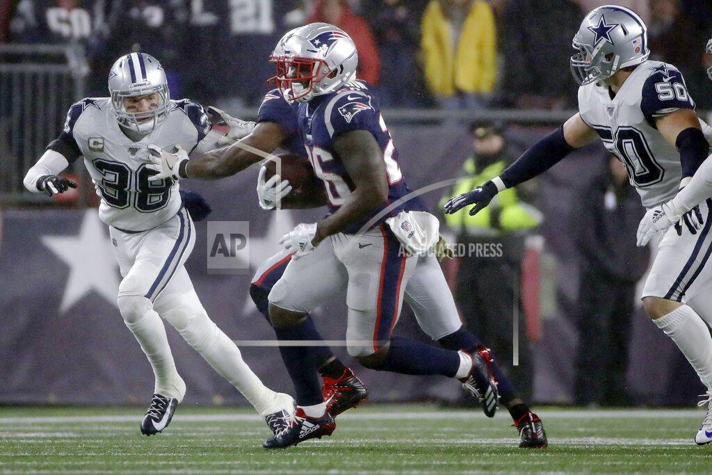Elise Amendola New England Patriots running back Sony Michel carries the ball as Dallas Cowboys defenders Jeff Heath, left, and Sean Lee, pursue in the first half of an NFL football game, Sunday, Nov. 24, 2019, in Foxborough, Mass. (AP Photo/Elise Amendola)