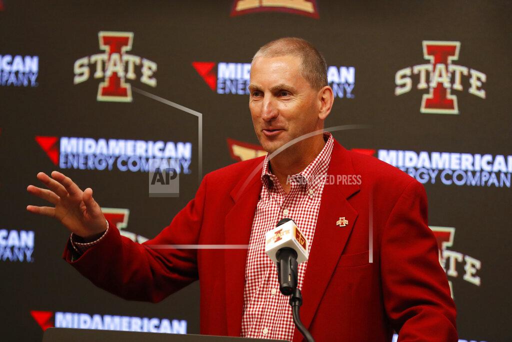 Charlie Neibergall FILE - In this Aug. 1, 2018, file photo, Iowa State Athletic Director Jamie Pollard speaks during an NCAA college football news conference, in Ames, Iowa. Iowa State President Wendy Wintersteen has transferred oversight of the Iowa State Center, a series of buildings near Hilton Coliseum and Jack Trice Stadium, to the athletic department. It has also tabbed athletic director Jamie Pollard to be the head of a process to redesign the area as an “arts, culture, and community district.” The school announced the plan on Tuesday, saying that Pollard and Iowa State Research Park President Rick Sanders will lead a feasibility study to build a multi-use development district between Hilton and Jack Trice _ which is now largely just parking lots. (AP Photo/Charlie Neibergall, File)