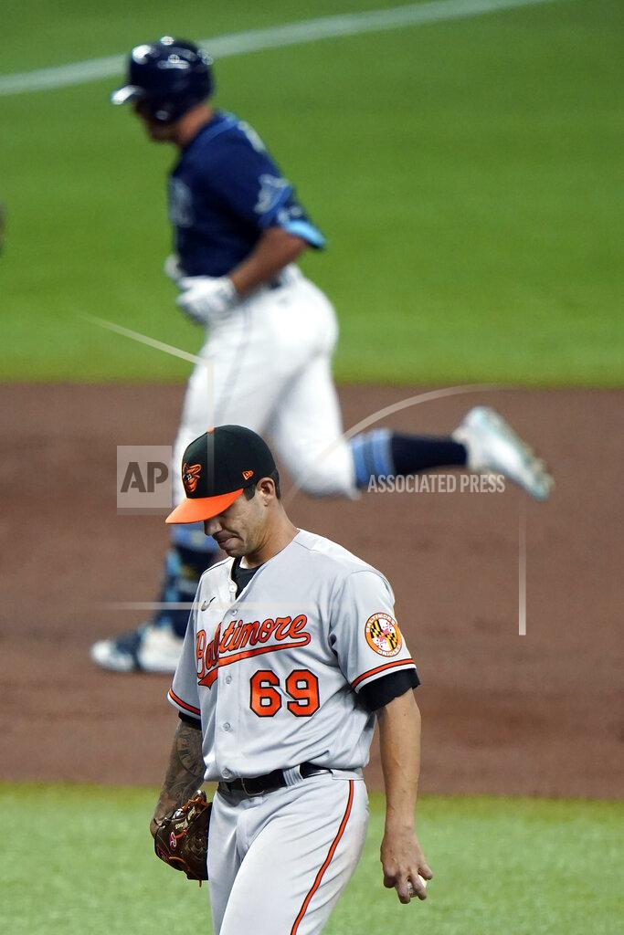 Chris O'meara Baltimore Orioles starting pitcher Tommy Milone (69) reacts as Tampa Bay Rays' Hunter Renfroe runs around the bases following his two-run home run during the second inning of a baseball game Tuesday, Aug. 25, 2020, in St. Petersburg, Fla. (AP Photo/Chris O'Meara)
