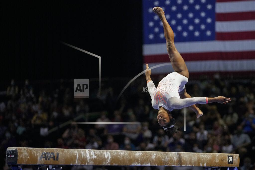 Aj Mast Simone Biles performs her balance beam routine during the U.S. Classic gymnastics competition in Indianapolis, Saturday, May 22, 2021. (AP Photo/AJ Mast)