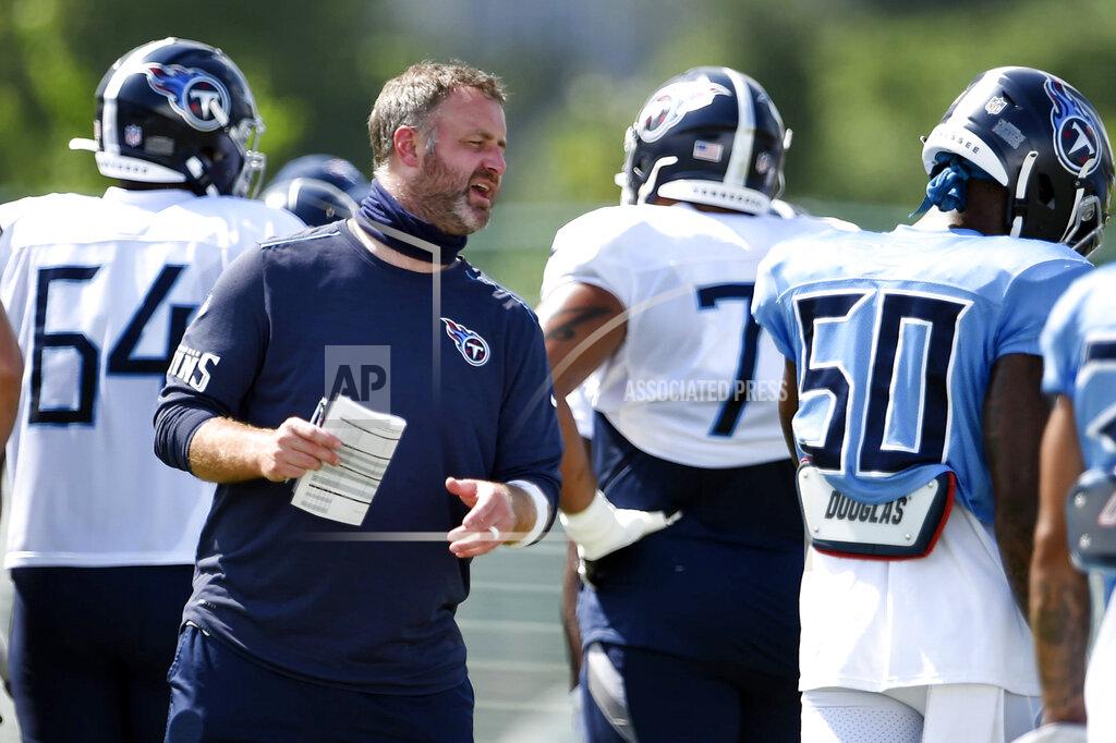 George Walker Iv FILE - In this Aug. 24, 2020, file photo, Tennessee Titans outside linebackers coach Shane Bowen instructs his players during NFL football training camp in Nashville, Tenn. Tennessee Titans coach Mike Vrabel announced promoting from within, Friday, Jan. 29, 2021. Todd Downing to offensive coordinator and Shane Bowen to defensive coordinator.(George Walker IV/The Tennessean via AP, Pool, File)