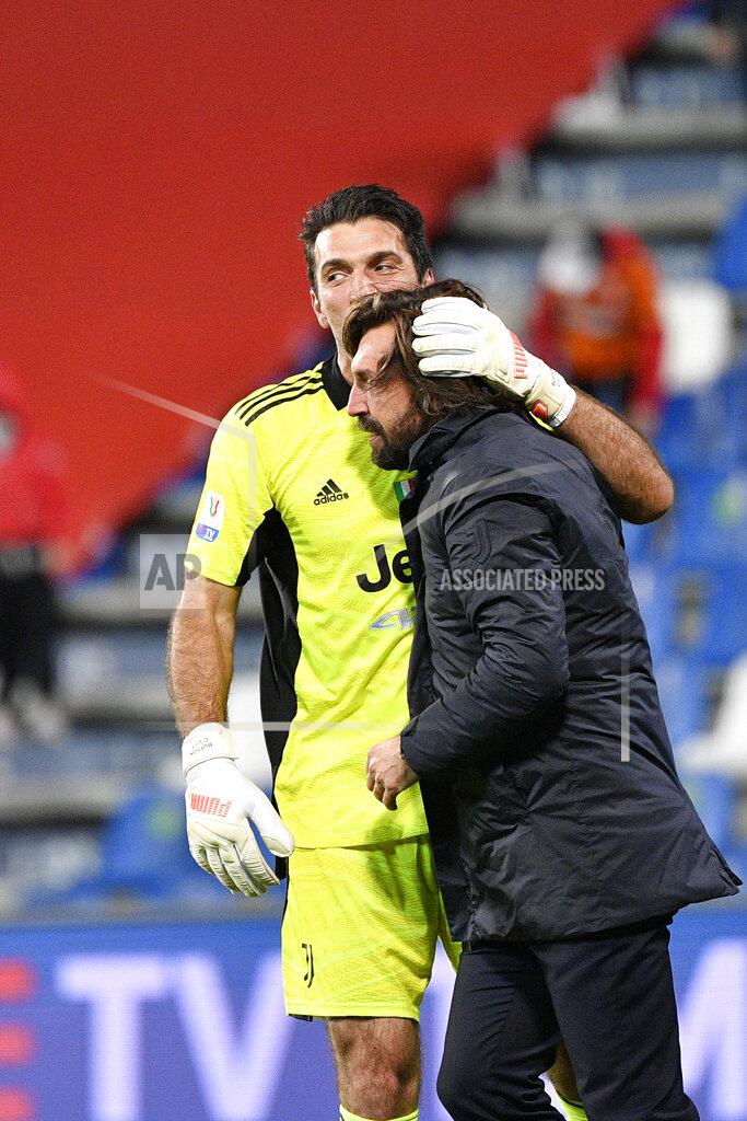 Fabrizio Corradetti Juventus goalie Gianluigi Buffon and coach Andrea Pirlo embrace after the Italian Cup soccer final match between Atalanta and Juventus at the Mapei Stadium in Reggio Emilia, Italy, Wednesday, May 19, 2021. (Fabrizio Corradetti/LaPresse via AP)
