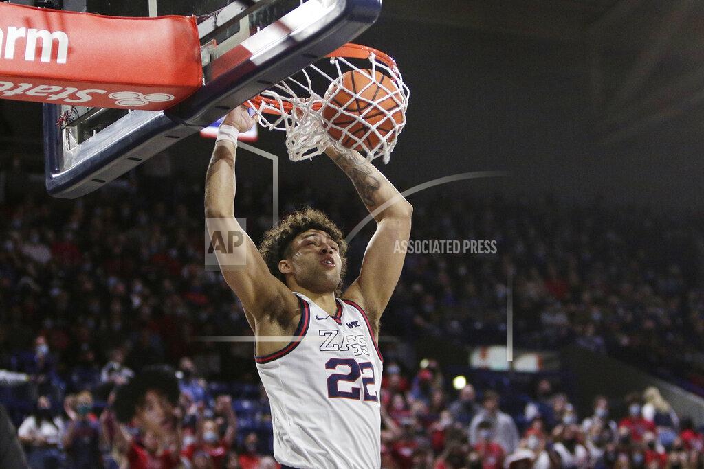 Young Kwak Gonzaga forward Anton Watson dunks during the first half of an NCAA college basketball game against Merrimack, Thursday, Dec. 9, 2021, in Spokane, Wash. (AP Photo/Young Kwak)