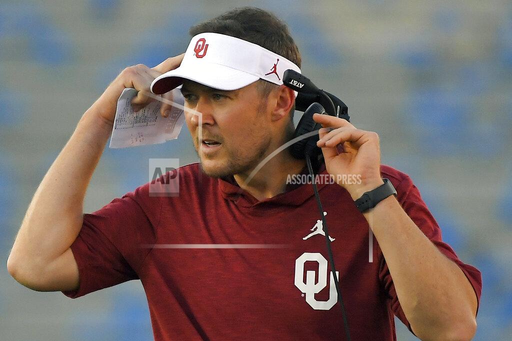 FILE - In this Sept. 14, 2019, file photo, Oklahoma coach Lincoln Riley stands on the sideline during the first half of the team's NCAA college football game against UCLA, in Pasadena, Calif. Baylor coach Matt Rhule and Oklahoma’s Lincoln Riley took over their teams under drastically different circumstances. Now they will coach against each other in the Big 12 championship game. (AP Photo/Mark J. Terrill, File)