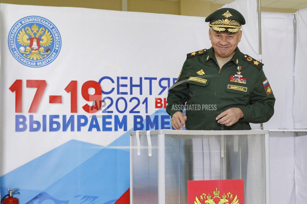 Vadim Savitsky In this handout photo released by the Russian Defense Ministry Press Service, Russian Defense Minister Sergei Shoigu smiles as he casts his ballot at a polling station during the Parliamentary elections in Moscow, Russia, Friday, Sept. 17, 2021. Russia has begun three days of voting for a new parliament that is unlikely to change the country's political complexion. There's no expectation that United Russia, the party devoted to President Vladimir Putin, will lose its dominance in the State Duma. (Vadim Savitsky/Russian Defense Ministry Press Service via AP)