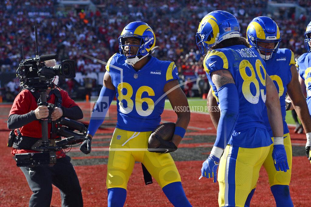 Jason Behnken Los Angeles Rams tight end Kendall Blanton (86) celebrates his 7-yard touchdown reception against the Tampa Bay Buccaneers during the first half of an NFL divisional round playoff football game Sunday, Jan. 23, 2022, in Tampa, Fla. (AP Photo/Jason Behnken)