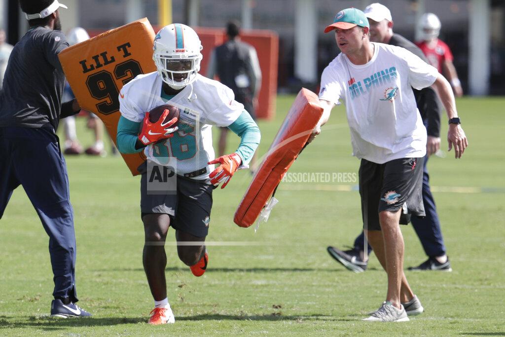 Lynne Sladky Miami Dolphins wide receiver Allen Hurns (86) runs drills during NFL football training camp, Friday, July 26, 2019, in Davie, Fla. Hurns, who suffered a leg injury with the Dallas Cowboys in January, signed a $3 million one-year contract Friday to play for his hometown team. (AP Photo/Lynne Sladky)