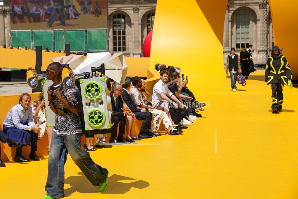 Francois Mori CORRECTS DATE A model wears a creation as part of the Louis Vuitton men's Spring Summer 2023 collection presented in Paris, France, Thursday, June 23, 2022. (AP Photo/Francois Mori)