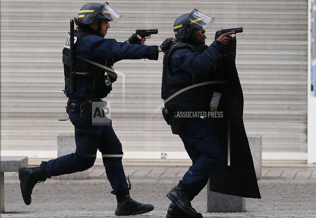 Francois Mori FILE - In this Nov. 18, 2015 file photo armed police operate in Saint-Denis, a northern suburb of Paris, Wednesday, Nov. 18, 2015. (AP Photo/Francois Mori)