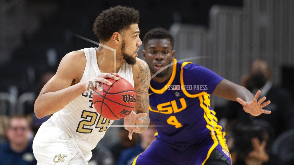Hakim Wright Sr. LSU forward Darius Days (4) defends against Georgia Tech center Rodney Howard (24) during the second half of an NCAA college basketball game Saturday, Dec. 11, 2021, in Atlanta. (AP Photo/Hakim Wright Sr.)