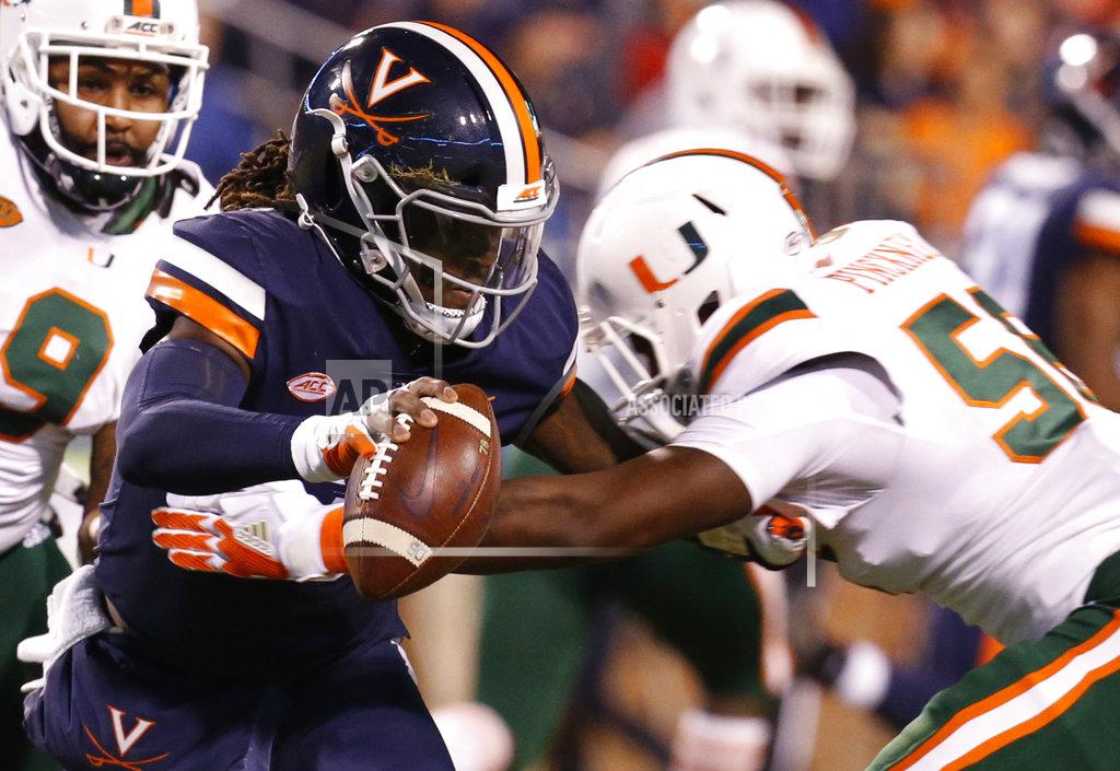 Steve Helber Miami linebacker Michael Pinckney (56) sacks Virginia quarterback Bryce Perkins (3) during the first half of an NCAA college football game in Charlottesville, Va., Saturday, Oct. 13, 2018. (AP Photo/Steve Helber)