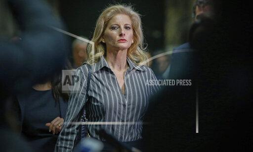 FILE - In this Dec. 5, 2017, file photo, Summer Zervos leaves Manhattan Supreme Court at the conclusion of a hearing in New York. Former President Donald Trump wants to countersue Zervos, a former "Apprentice" contestant, who accused him of defaming her when he denied her sexual assault allegations. Trump lawyer Alina Habba asked a court’s permission Monday, Oct. 18, 2021, to pursue a counterclaim against Zervos. (AP Photo/Kathy Willens, File)