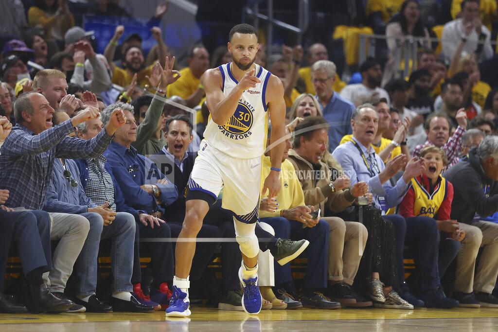 Jed Jacobsohn Golden State Warriors guard Stephen Curry reacts after scoring against the Dallas Mavericks during the first half of Game 2 of the NBA basketball playoffs Western Conference finals in San Francisco, Friday, May 20, 2022. (AP Photo/Jed Jacobsohn)