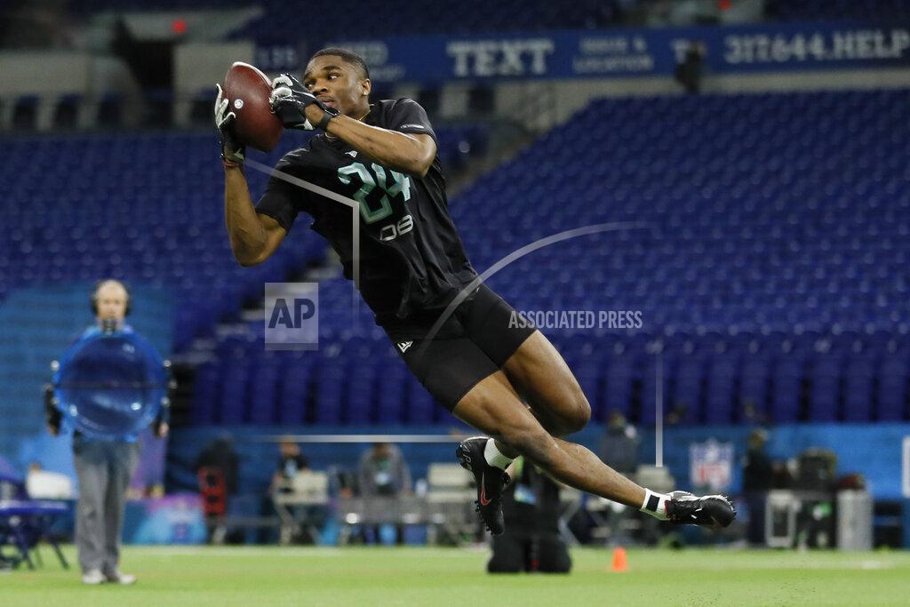 Charlie Neibergall FILE - In this March 1, 2020, file photo, Ohio State defensive back Jeff Okudah runs a drill at the NFL football scouting combine in Indianapolis Okudah is a likely first-round pick in the NFL draft Thursday, April 23, 2020. (AP Photo/Charlie Neibergall, File)
