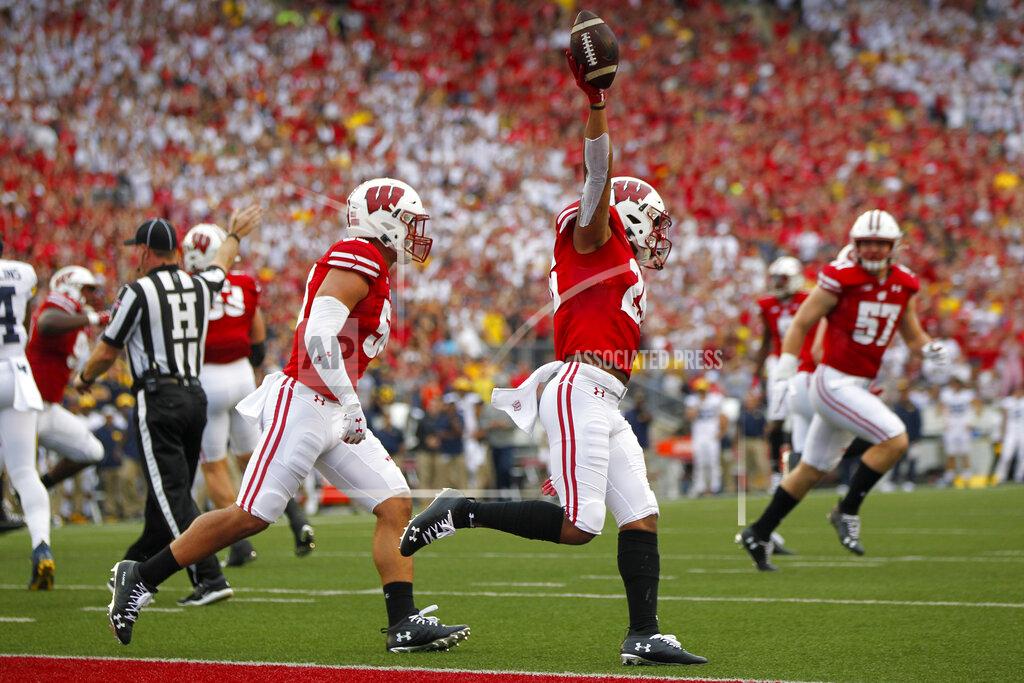 Andy Manis Wisconsin running back Jonathan Taylor celebrates a touchdown against Michigan during the first half of an NCAA college football game Saturday, Sept. 21, 2019, in Madison, Wis. Wisconsin won 35-14. (AP Photo/Andy Manis)