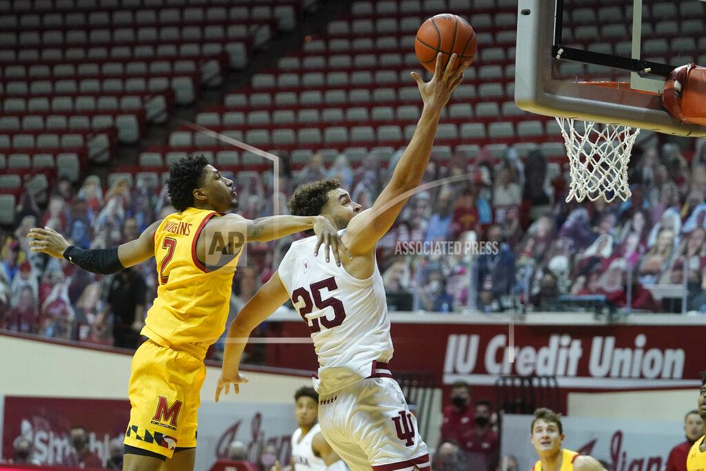 Darron Cummings Indiana forward Race Thompson (25) shoots against Maryland guard Aaron Wiggins (2) during the second half of an NCAA college basketball game, Monday, Jan. 4, 2021, in Bloomington, Ind. (AP Photo/Darron Cummings)
