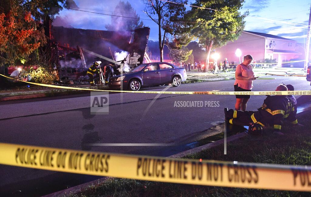 Jimmy May Firefighters set up lights in front of a fatal house fire at 733 First Street in Nescopeck, Pa, Friday, Aug. 5, 2022. The fire in Nescopeck was reported around 2:30 a.m. The cause of the fire remains under investigation.
(Jimmy May/Bloomsburg Press Enterprise via AP)