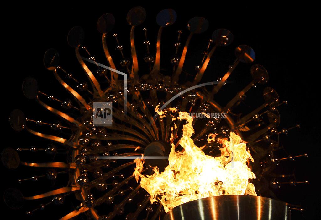 Gregory Bull Flames burn in the Olympic cauldron after being lit during the opening ceremony of the 2016 Summer Olympics in Rio de Janeiro, Brazil, Saturday, Aug. 6, 2016. (AP Photo/Gregory Bull)