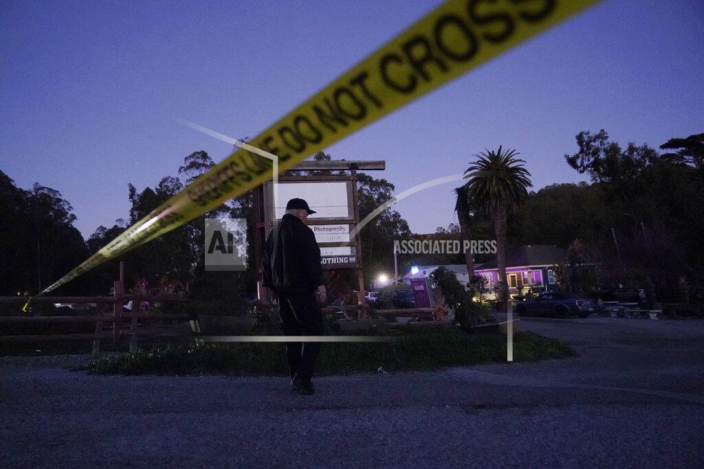 Jeff Chiu Police tape is placed near the scene of a shooting Monday, Jan. 23, 2023, in Half Moon Bay, Calif. Multiple people were killed in two related shootings Monday at a mushroom farm and a trucking firm in a coastal community south of San Francisco, and officials say a suspect is in custody. (AP Photo/Jeff Chiu)