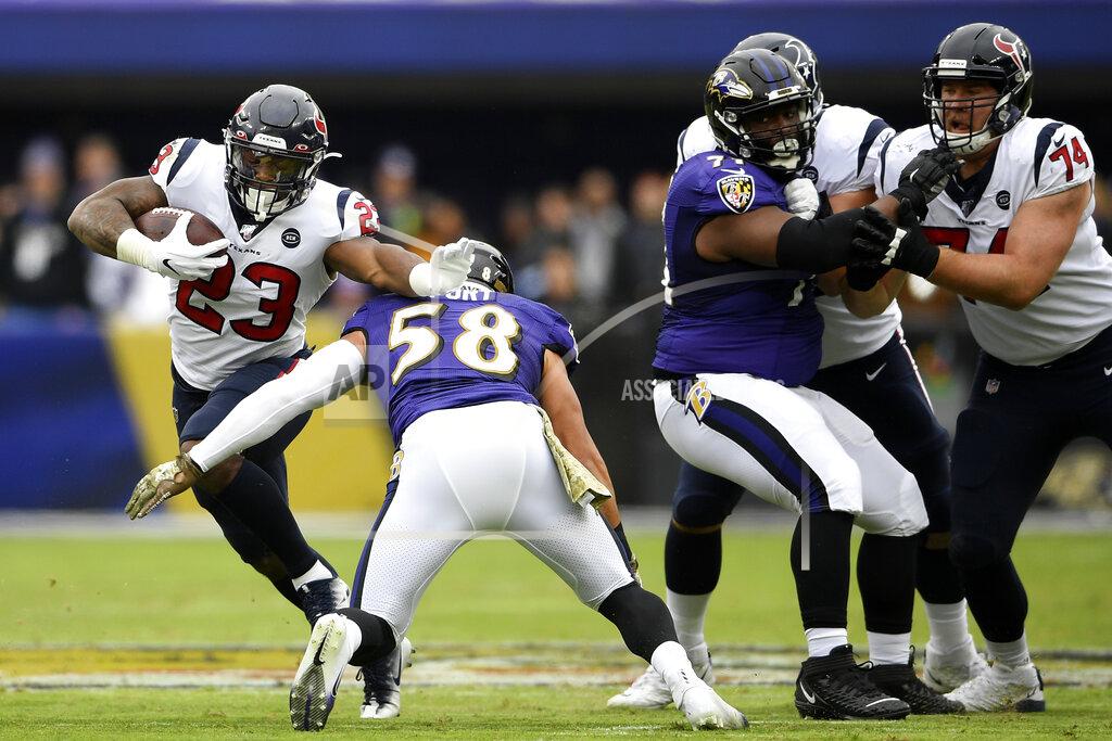 Nick Wass Houston Texans running back Carlos Hyde (23) runs with the ball as Baltimore Ravens linebacker L.J. Fort (58) prepares to make the tackle during the first half of an NFL football game, Sunday, Nov. 17, 2019, in Baltimore. (AP Photo/Nick Wass)