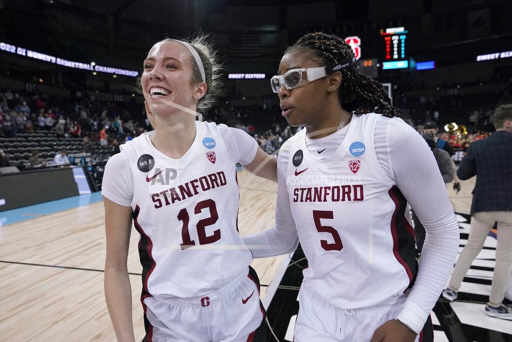 Ted S. Warren Stanford guard Lexie Hull (12) and forward Francesca Belibi (5) react after a college basketball game against Maryland in the Sweet 16 round of the NCAA tournament, Friday, March 25, 2022, in Spokane, Wash. Stanford won 72-66. (AP Photo/Ted S. Warren)