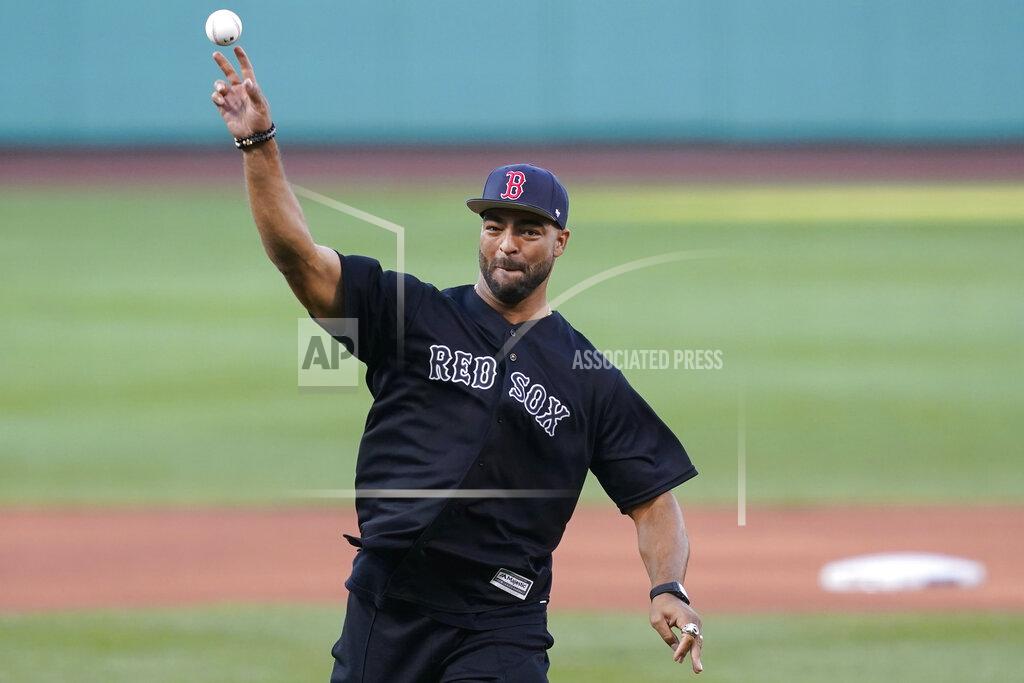 Elise Amendola New England Patriots football player Kyle Van Noy throws a ceremonial first pitch before a baseball game between the Boston Red Sox and the New York Yankees at Fenway Park, Friday, July 23, 2021, in Boston. (AP Photo/Elise Amendola)