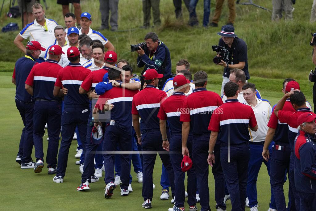 Jeff Roberson Team USA shakes hands with Team Europe after the Ryder Cup matches at the Whistling Straits Golf Course Sunday, Sept. 26, 2021, in Sheboygan, Wis. (AP Photo/Jeff Roberson)