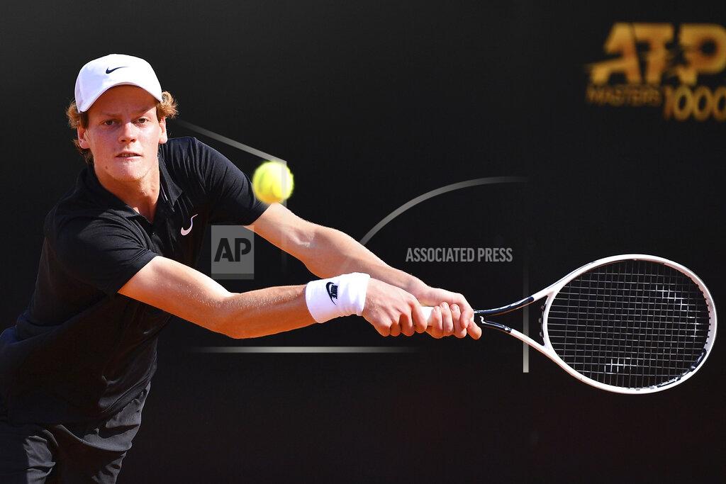 Alfredo Falcone Italy's Jannik Sinner returns the ball to Greece's Stefanos Tsitsipas, at the Italian Open tennis tournament in Rome, Wednesday, Sept. 16, 2020. (Alfredo Falcone/LaPresse via AP)