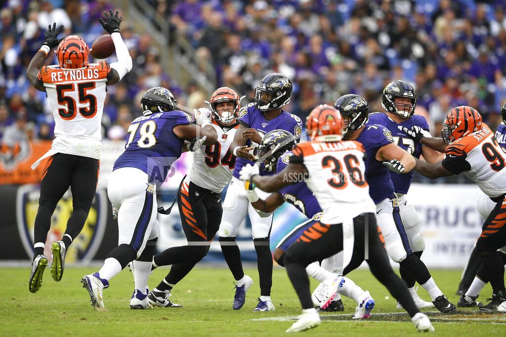 Nick Wass Cincinnati Bengals linebacker LaRoy Reynolds (55) blocks a pass from Baltimore Ravens quarterback Lamar Jackson, center, during the second half of a NFL football game Sunday, Oct. 13, 2019, in Baltimore. (AP Photo/Nick Wass)