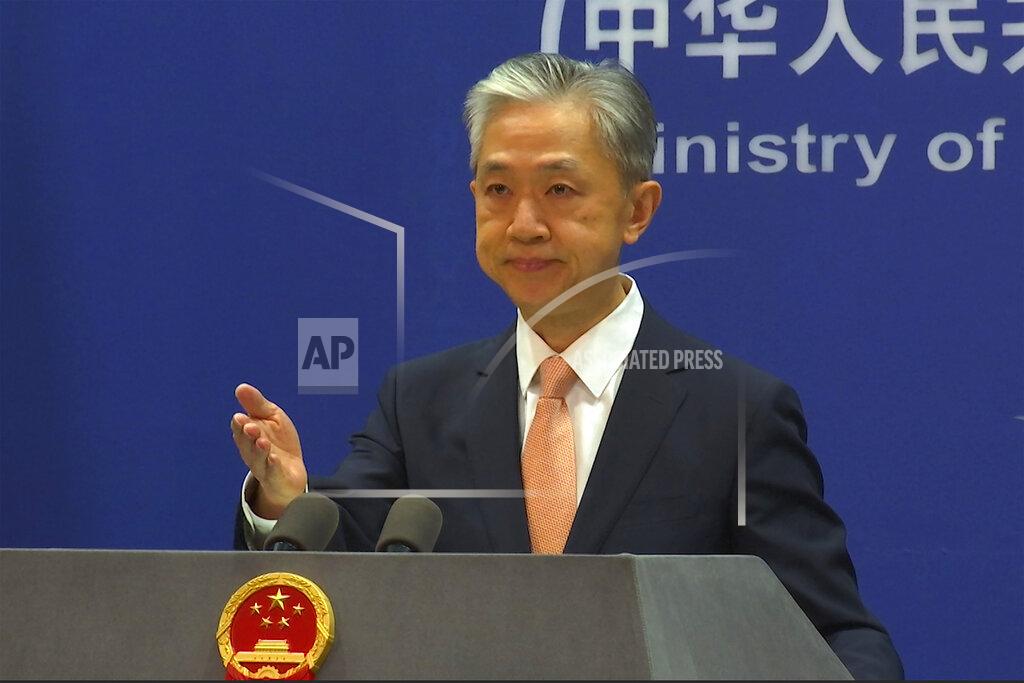 Liu Zheng Chinese Foreign Ministry spokesperson Wang Wenbin reacts during the daily presser at the Ministry of Foreign Affiairs in Beijing, Friday, May 27, 2022. China on Friday criticized a speech by U.S. Secretary of State Antony Blinken focused on relations between the world's top two economic powers, saying the U.S. was seeking to smear Beijing's reputation. (AP Photo/Liu Zheng)