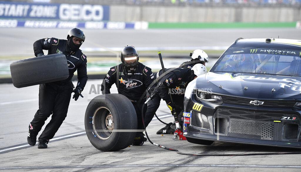 Timothy D. Easley Landon Cassill makes a pit stop during the NASCAR Cup Series auto race at Kentucky Speedway in Sparta, Ky., Saturday, July 13, 2019. (AP Photo/Timothy D. Easley)