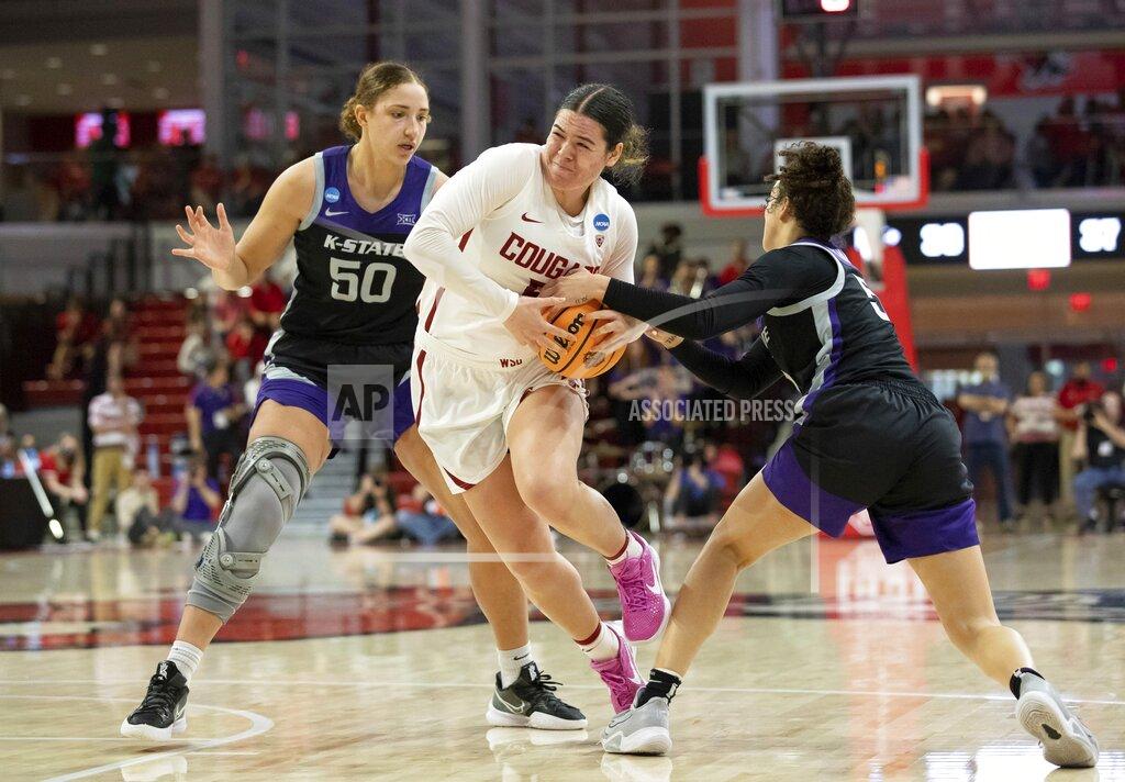 Ben Mckeown Washington State's Charlisse Leger-Walker, center, drives against Kansas State's Ayoka Lee (50) and Kansas State's Brylee Glenn, right, during the second half of a college basketball game in the first round of the NCAA tournament in Raleigh, N.C., Saturday, March 19, 2022. (AP Photo/Ben McKeown)