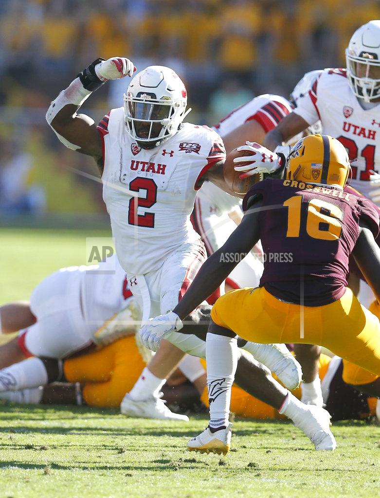 Rick Scuteri Utah running back Zack Moss (2) looks for a first down in front of Arizona State safety Aashari Crosswell in the second half during an NCAA college football game, Saturday, Nov. 3, 2018, in Tempe, Ariz. (AP Photo/Rick Scuteri)