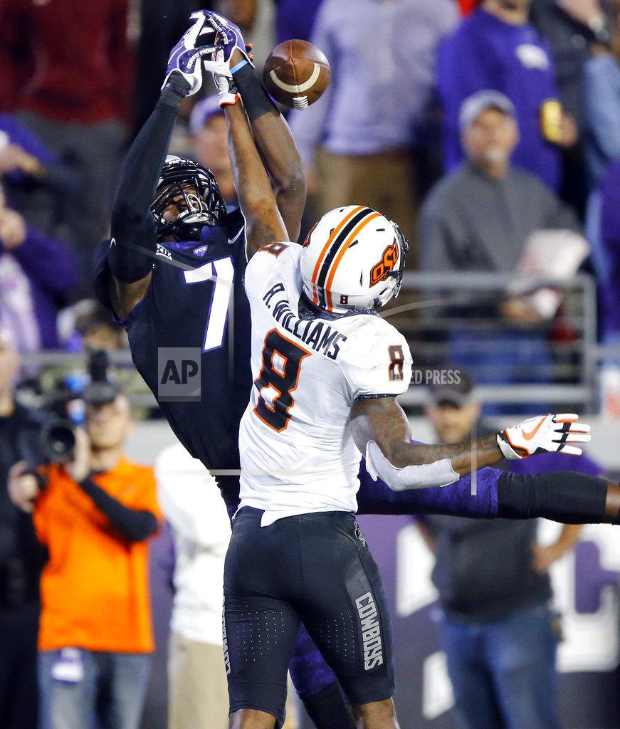 Tom Fox Oklahoma State cornerback Rodarius Williams (8) defends on a pass to TCU wide receiver John Stephens Jr. (7) during the fourth quarter of an NCAA college football game in Fort Worth, Texas, Saturday, Nov. 24, 2018. Williams was called for pass interference. (Tom Fox/The Dallas Morning News via AP)