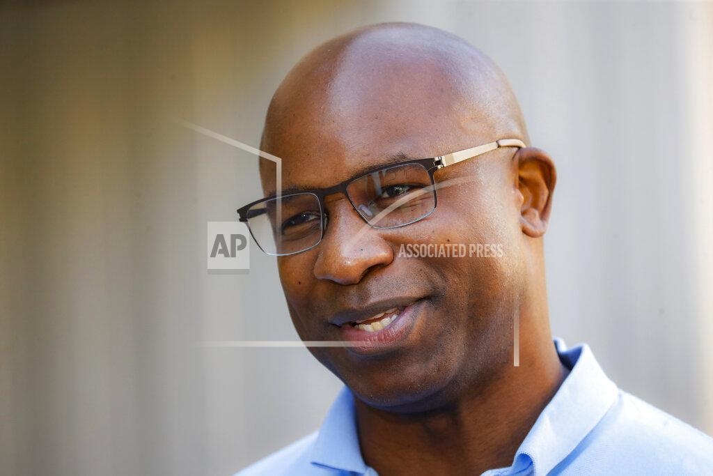 John Minchillo Jamaal Bowman speaks to reporters after voting at a polling station inside Yonkers Middle/High School, Tuesday, June 23, 2020, in Yonkers, N.Y. Bowman is running against veteran Rep. Eliot Engel in the Democratic primary for New York's 16th Congressional District. (AP Photo/John Minchillo)