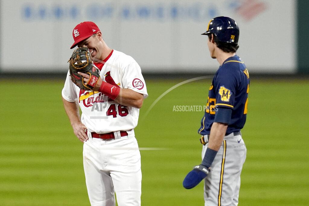 Jeff Roberson St. Louis Cardinals first baseman Paul Goldschmidt (46) laughs as he talks with Milwaukee Brewers' Christian Yelich during a pause in the action in the fifth inning of a baseball game Thursday, Sept. 24, 2020, in St. Louis. (AP Photo/Jeff Roberson)