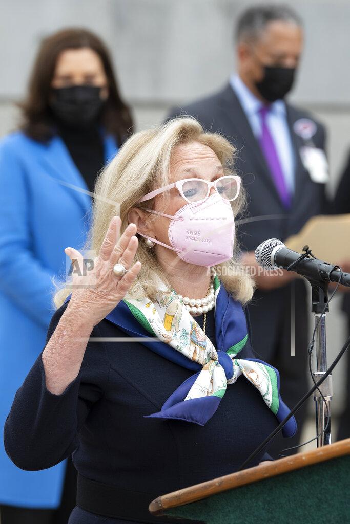 U.S. Representative Debbie Dingell speaks about the COVID-19 vaccination effort during a press conference outside the Eastern Michigan University Convocation Center, which was hosting a vaccination clinic, Monday, April 12, 2021, in Ypsilanti, Mich. (Lon Horwedel/Detroit News via AP)
