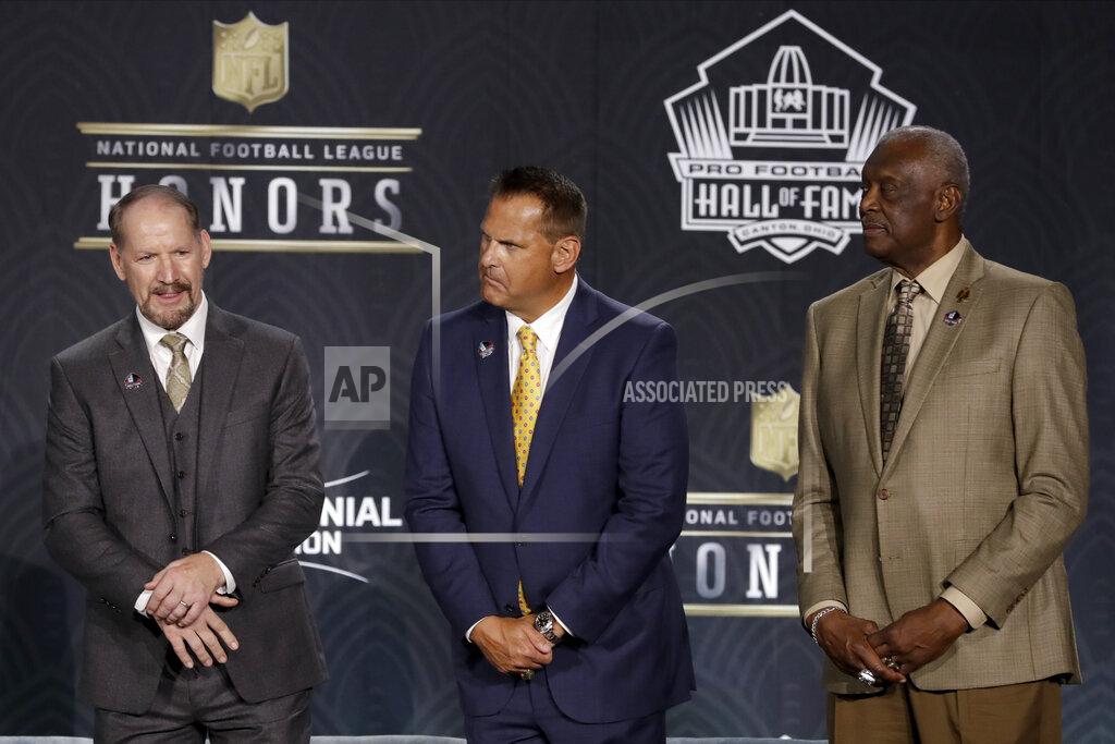 Mark Humphrey Hall of Fame Class of 2020,, from left, Bill Cowher, Jim Covert and Harold Carmichael at the NFL Honors football award show Saturday, Feb. 1, 2020, in Miami. (AP Photo/Mark Humphrey)