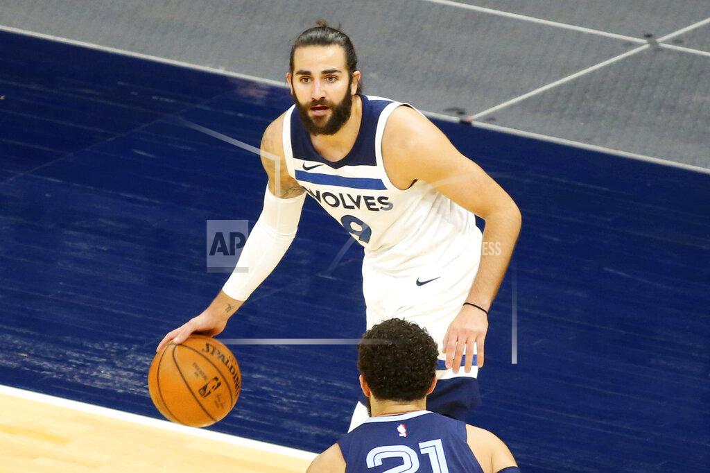 Andy Clayton-King Minnesota Timberwolves guard Ricky Rubio (9) drives against Memphis Grizzlies guard Tyus Jones (21) in the first quarter during an NBA preseason basketball game, Saturday, Dec. 12, 2020, in Minneapolis. (AP Photo/Andy Clayton- King)