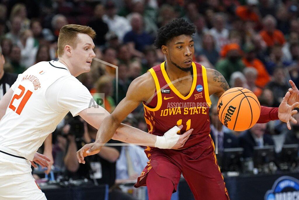 Charles Rex Arbogast Iowa State's Tyrese Hunter tries to get past Miami's Sam Waardenburg during the second half of a college basketball game in the Sweet 16 round of the NCAA tournament Friday, March 25, 2022, in Chicago. (AP Photo/Charles Rex Arbogast)