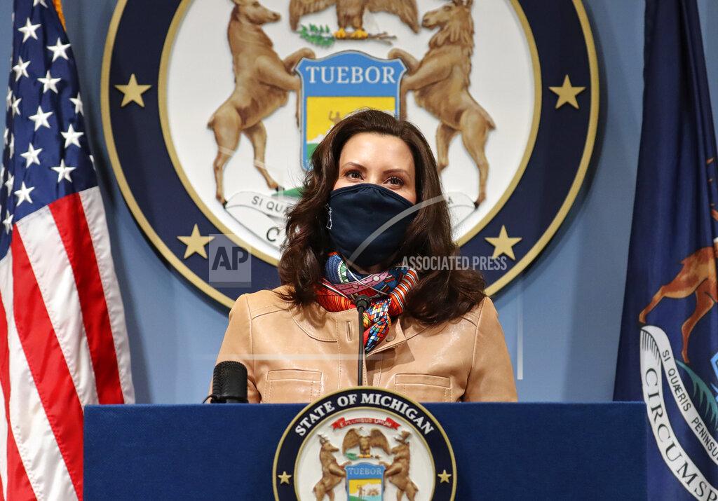 Uncredited In this photo provided by the Michigan Office of the Governor, Gov. Gretchen Whitmer addresses the state during a speech in Lansing, Mich. Friday, April 9, 2021. Faced with the country's highest rate of new coronavirus infections, Whitmer on Friday urged a two-week suspension of in-person high school classes, all youth sports and indoor restaurant dining. (Michigan Office of the Governor via AP)